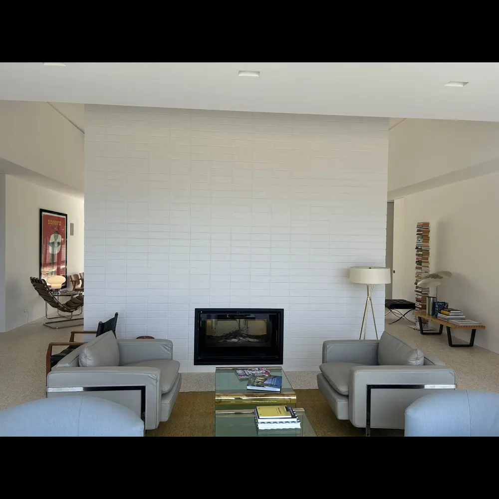 White brick feature fireplace wall